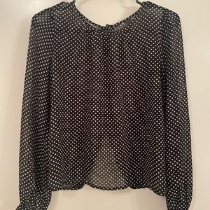 Long sleeved women’s polka dot blouse